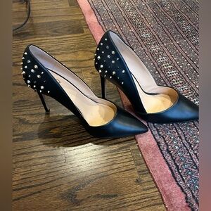 Studded black pumps